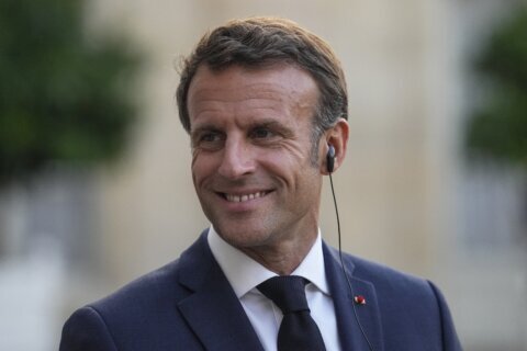 France’s Macron lands 1st state visit of Biden’s presidency
