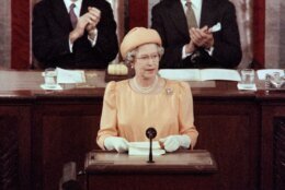Vice President Dan Quayle (L) and Speaker of the United States House of Representatives Thomas Foley (R) applaud as Britain's Queen Elizabeth II adresses a joint meeting of the US Senate and House of Representatives in Washington on May 16, 1991. - The Queen's speech, the first adresses to Congress by a British monarch, dealt with U.S.- British cooperation in the Gulf War. (Photo by Jennifer LAW / AFP) (Photo by JENNIFER LAW/AFP via Getty Images)