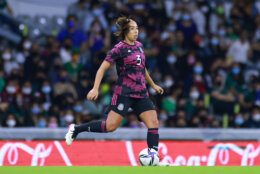 MEXICO CITY, MEXICO - SEPTEMBER 21: Karina Rodriguez of Mexico drives the ball during the women's international friendly between Mexico and Colombia at Azteca Stadium on September 21, 2021 in Mexico City, Mexico. (Photo by Hector Vivas/Getty Images)