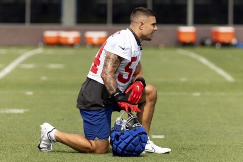 Giants release Martinez less than a year after ACL tear