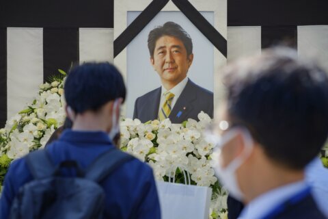 Japanese former leader Abe honored at divisive state funeral