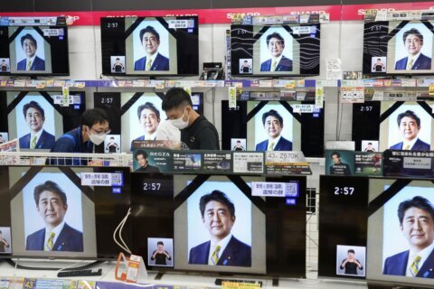 Abe’s militaristic funeral captures Japan’s tense mood
