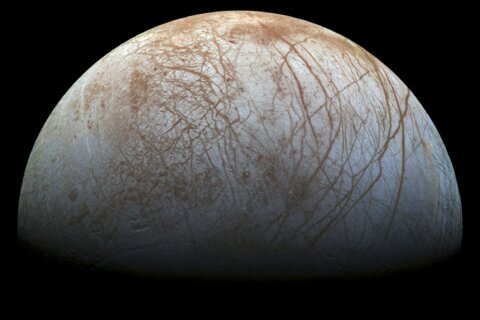 NASA spacecraft buzzes Jupiter moon Europa, closest in years