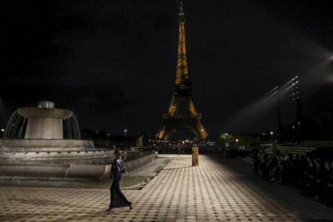 Cher appears at Balmain finale at Paris Fashion Week