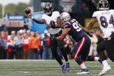 Jackson accounts for 5 TDs, Ravens hold off Patriots 37-26