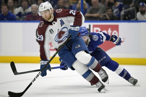 AP source: MacKinnon signs 8-year deal, highest paid in NHL