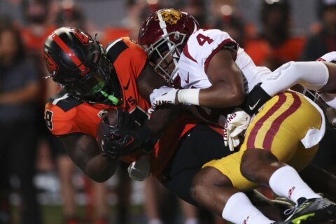 Addison’s late TD gives No. 7 USC 17-14 win over Oregon St
