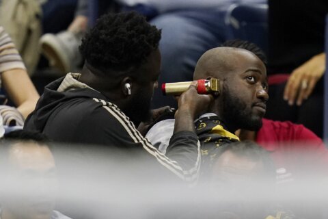 Hairy situation at US Open: 2 removed for haircut in stands