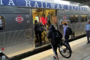 Passengers get on VRE train