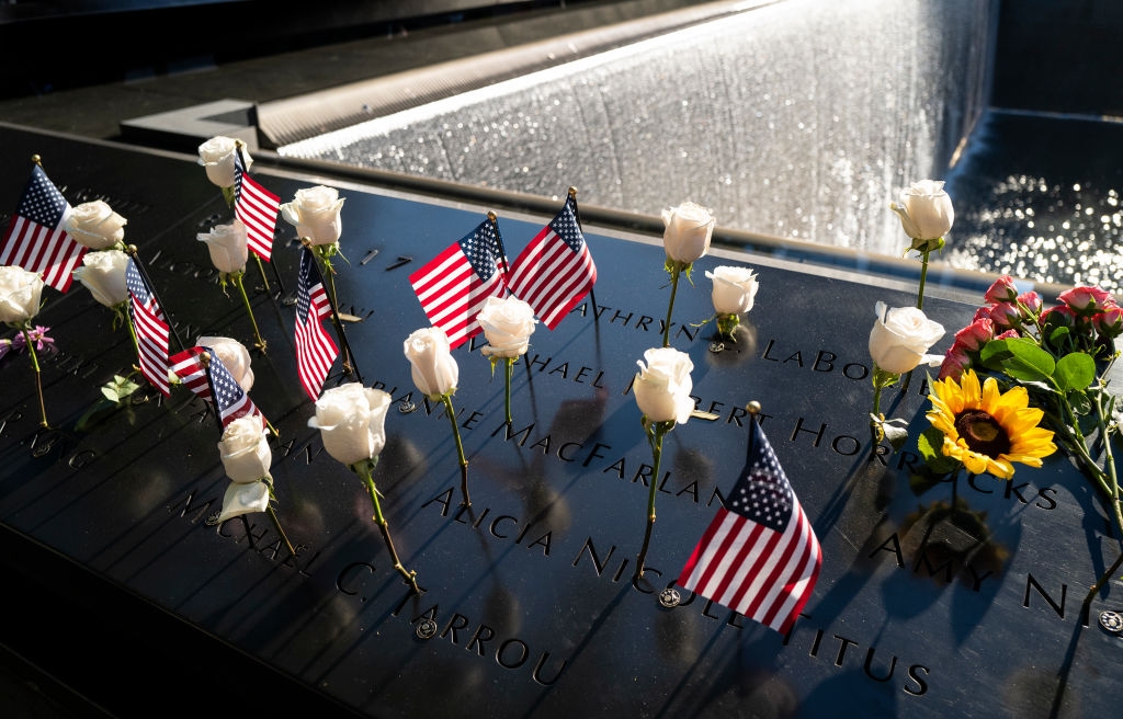 &lt;p&gt;NEW YORK, NEW YORK &#8211; SEPTEMBER 11: Flags and flowers adorn the names of the victims of the attacks of Sept. 11, 2001, during a ceremony at the 9/11 Memorial and Museum on September 11, 2021 in New York City. The nation is marking the 20th anniversary of the terror attacks of September 11, 2001, when the terrorist group al-Qaeda flew hijacked airplanes into the World Trade Center, Shanksville, PA and the Pentagon, killing nearly 3,000 people. (Photo by Craig Ruttle-Pool/Getty Images)&lt;/p&gt;
