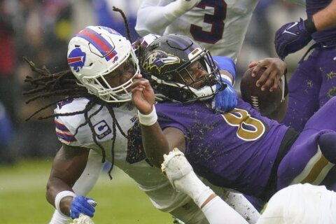 Ravens’ Harbaugh stands by 4th-down call in loss to Bills