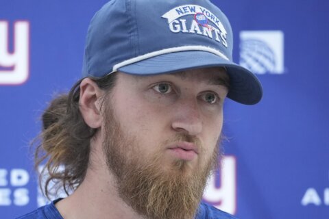 Punter Gillan returns from London and practices with Giants