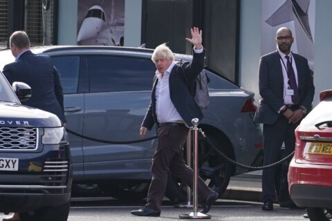 Johnson returns to UK amid rumors he will run for leader