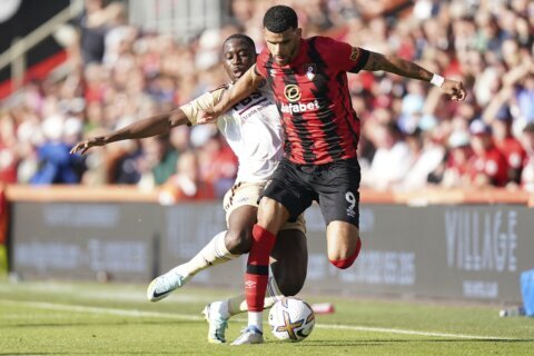 Bournemouth rallies to beat Leicester with Foley watching on