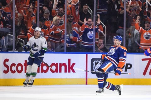 Connor McDavid opens with hat trick, Oilers beat Canucks 5-3
