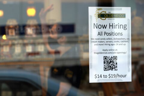 US hiring stayed solid in September as employers add 263,000