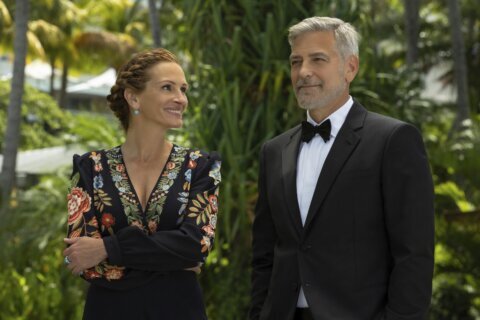 Review: Roberts, Clooney reunite in ‘Ticket to Paradise’