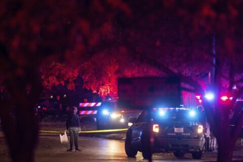 Police: Driver shot at Omaha block party drove at officer