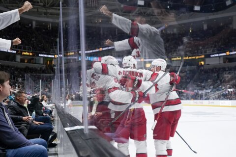 Aho’s late goal leads Hurricanes past Sharks 2-1