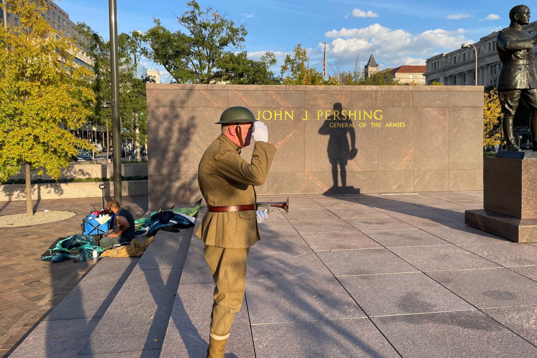 Colonel John R. Thomas (retired)  plays "Taps" at the WW1 Memorial in Washington, D.C. 