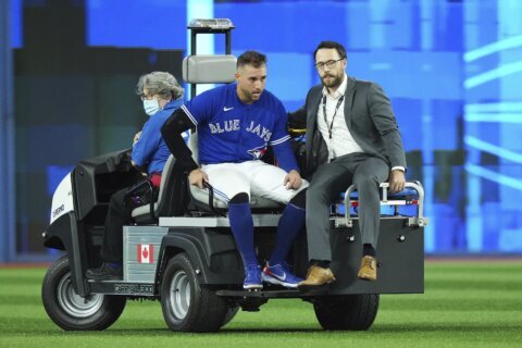 Jays OF Springer awaiting travel clearance after concussion