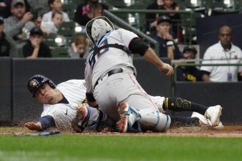 Marlins win in 12, putting Brewers’ playoff hopes on ropes