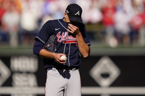 Braves’  Morton hit in elbow by liner, exits NLDS Game 4