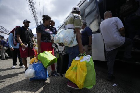 Venezuelans halted in Panama by US policy change return home