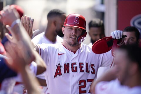 Trout hits 39th HR, Angels beat Texas 8-3 for 7th straight W