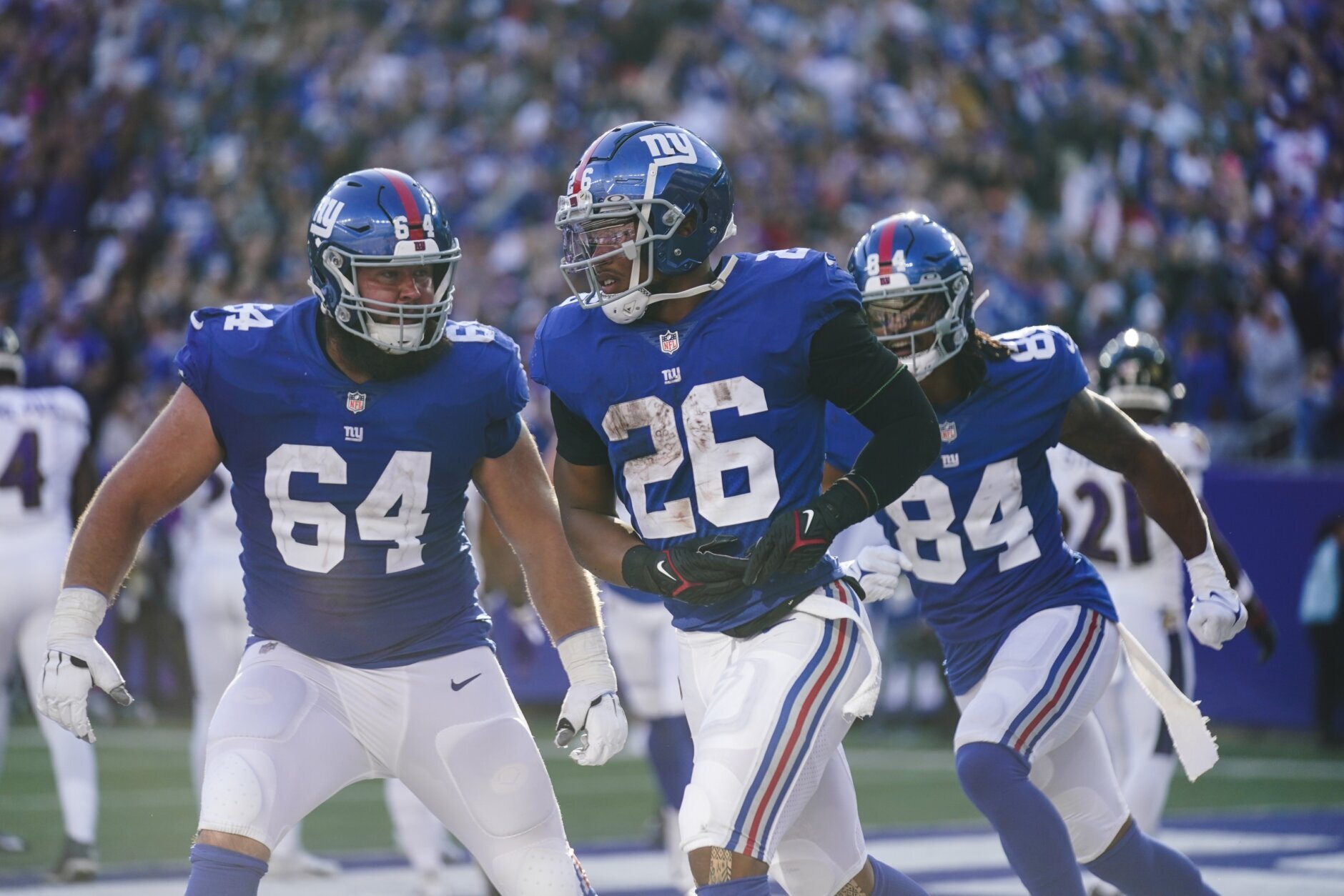 Saquon Barkley of the New York Giants runs the ball to score a 36