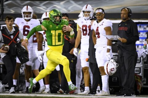 Nix has 4 TDs and No. 13 Oregon downs Stanford 45-27