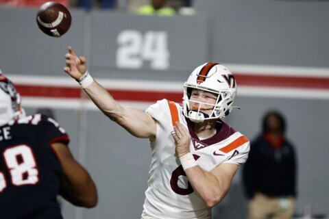 Virginia Tech tries to snap its 4-game losing streak in bowls against No. 23 Tulane in Military Bowl