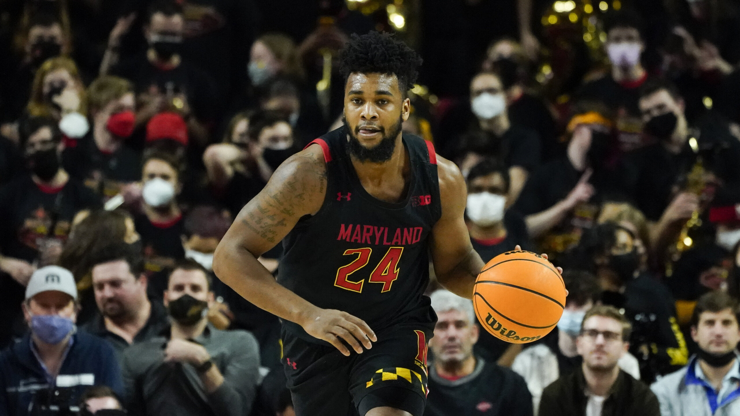 Scott scores 18, No. 22 Maryland blows out Louisville 79-54