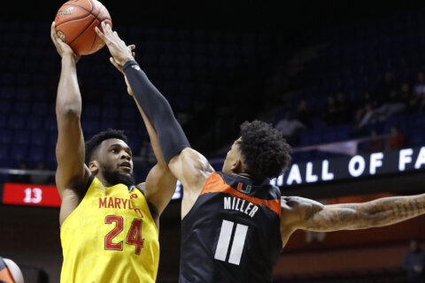 Scott leads Maryland explosion in 88-70 win over Miami
