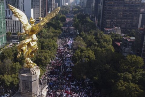 Mexico’s López Obrador leads massive pro-government march
