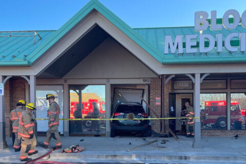 3 hurt as car crashes into Germantown building