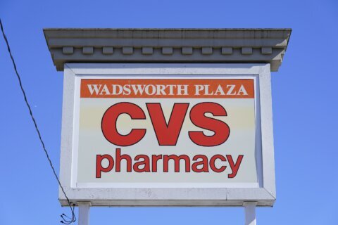 CVS Health tops forecasts, reserves billions for settlement