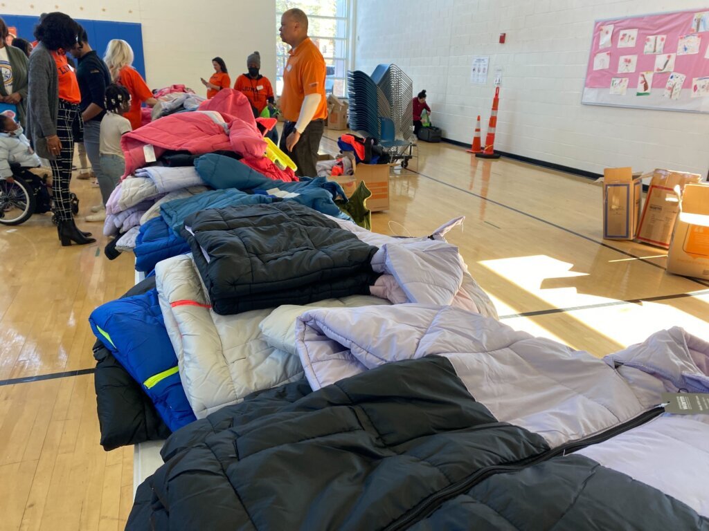 Operation Warm teamed up with the Laborers International Union of North America and Monumental Sports to hand out hundreds of new coats Monday at a Southeast D.C. school.
