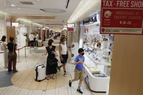 Japan’s economy shrinks as consumers hold back on spending