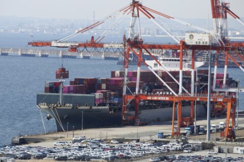 Japan racks up trade deficit as exports, imports hit records