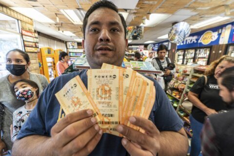 Q&A: A look at $1.9B Powerball jackpot, how it grew so large