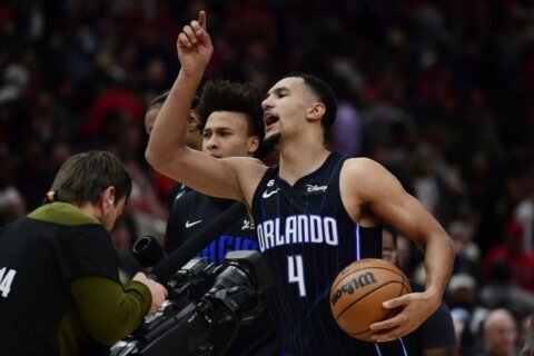 Suggs nails 3, Magic beat Bulls 108-107 after blowing lead