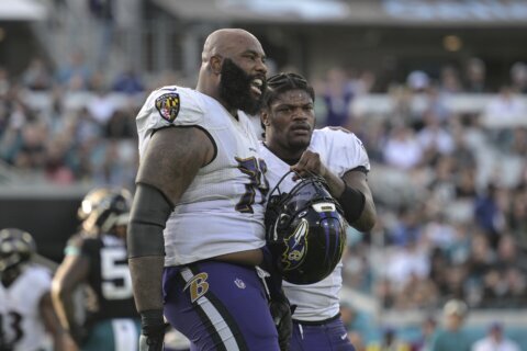 Jets acquiring offensive tackle Morgan Moses from Ravens in deal that includes picks, AP source says