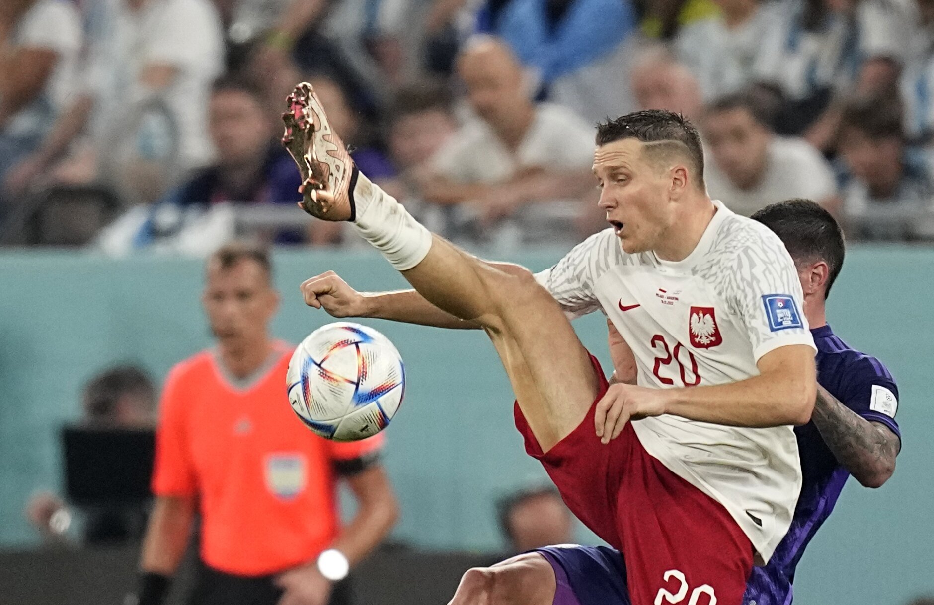 Messi and Argentina advance at World Cup, beat Poland 2-0