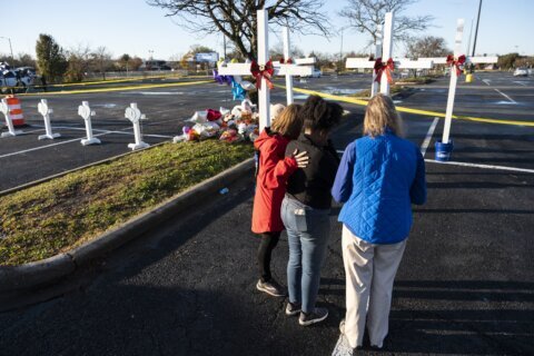 Virginia city holds vigil to honor Walmart shooting victims