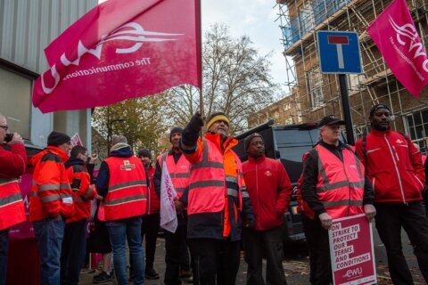 In Britain, nearly 200,000 workers are striking on Black Friday