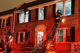 DC Fire and EMS reported at the scene, where one person was transported with life-threatening injuries, and tried to contain the fire from spreading to neighboring homes. (Photo courtesy DC Fire and EMS)