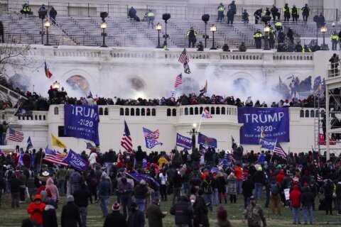 Man gets 14 months in prison for his role in US Capitol riot