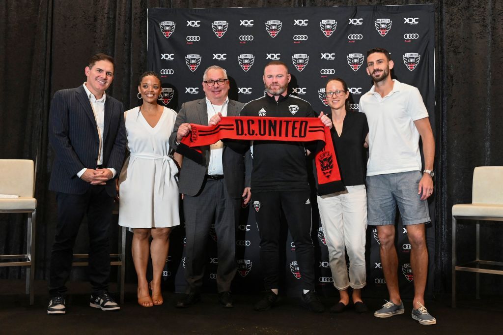 <h3>Rooney&#8217;s return to Washington</h3>
<p>Wayne Rooney is back with D.C. United for a second time.</p>
<p>It is incredible to me that I am writing this sentence because I marvel Rooney had a first time with United. When Rooney wore the Black and Red jersey and as a player, he took us on a memory-filled ride through the 2018 and 2019 seasons. Now, Rooney — one of the greatest players in the world to lace up the boots —  is in charge of D.C. United as head coach.</p>
<p>It was not expected. United had momentum from 2021 and almost made the playoffs in Hernan Losada’s first season as coach. But early in the 2022 campaign, it became clear to United management that the players were not responding to Losada’s tactics.</p>
<p>Rooney was available to join United because his English Football League Derby County ran into financial trouble. Despite the Rams&#8217; money troubles, Rooney stayed with the team through difficult times and developed younger players.</p>
<p>Rooney wants to coach at the highest level. To do that, Rooney has to create a success story in D.C. He knows that and every indication is Rooney is approaching coaching with the same level of commitment that brought him success as a player.</p>
<p><em>— Dave Johnson</em></p>
