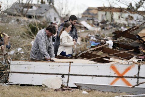 Kentucky remembers tornado victims as rebuilding continues
